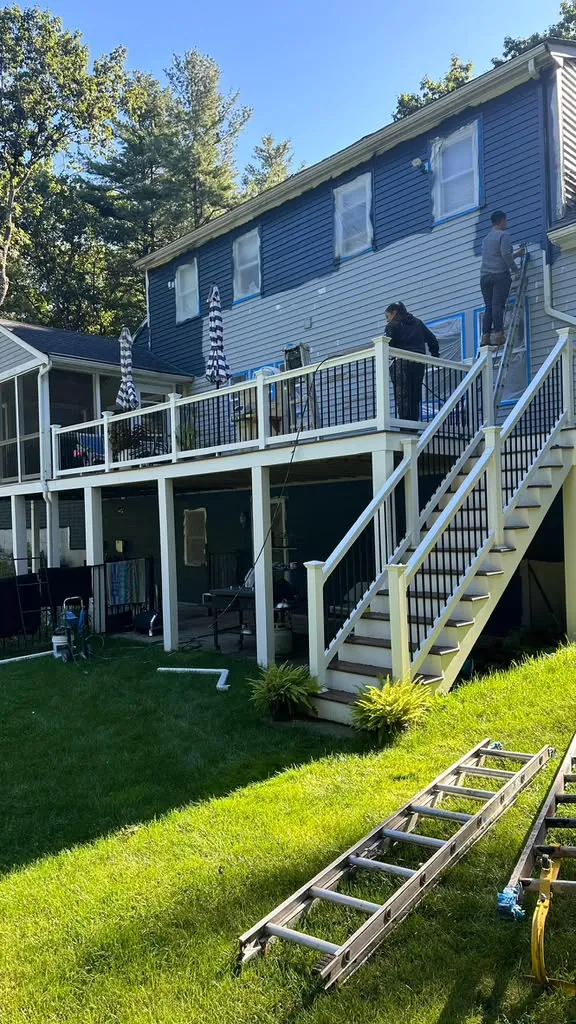 Newly painted deck and exterior stairs in Greater Boston, MA