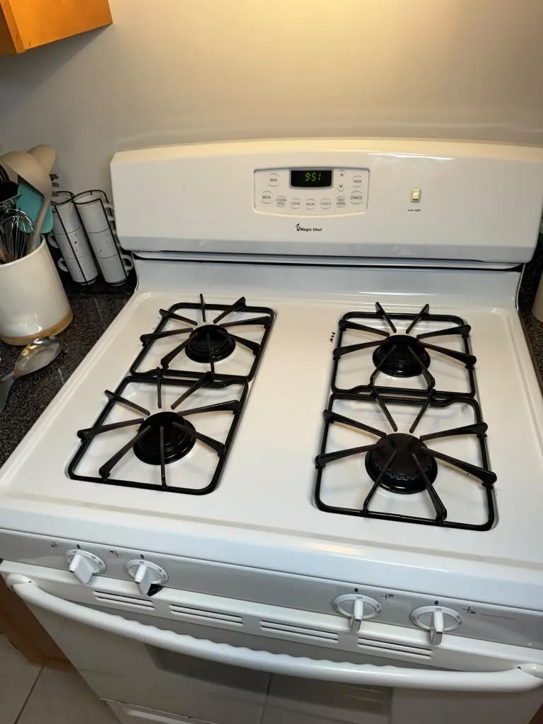 Spotless kitchen stovetop after a deep cleaning in Greater Boston, MA